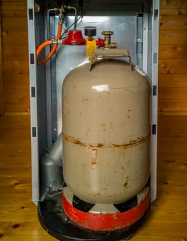 MOERS, GERMANY - JULY 10 2019 : Gas bottle standing in gas heater.