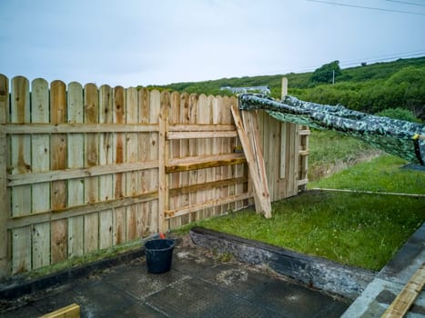 Concept of building a wooden fence.