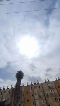 Blue gray light sky nature white clouds whether background , city town. High quality photo