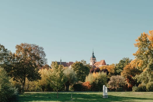 House with nice garden in fall. Flowers in the Park. Bietigheim-Bissingen. Germany, Europe. Autumn Park and house, nobody, bush and grenery