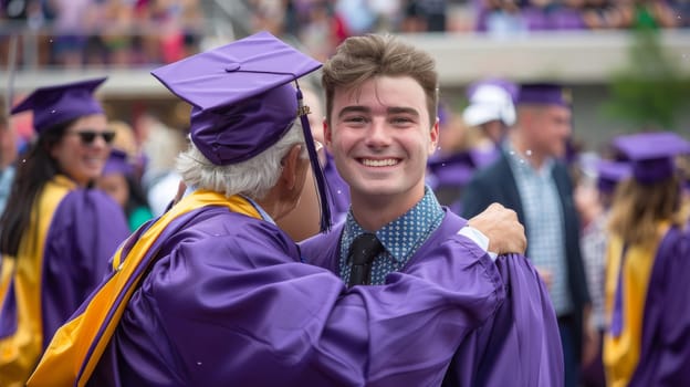 A man in purple graduation gown hugging another person