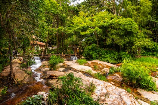 Beautiful waterfall on Doi Suthep Hiking Trail Wat Pha Lat in tropical jungle nature forest in Chiang Mai Amphoe Mueang Chiang Mai Thailand in Southeastasia Asia.