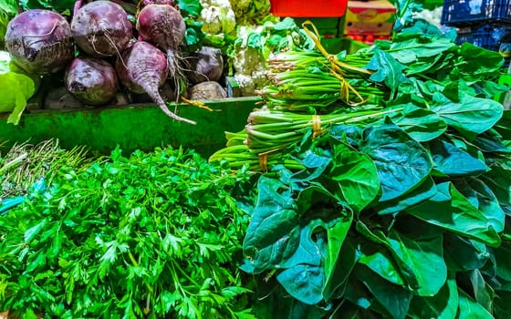 Fresh vegetables Fruit and salad Greens Herbs at the mexican market in Zicatela Puerto Escondido Oaxaca Mexico.