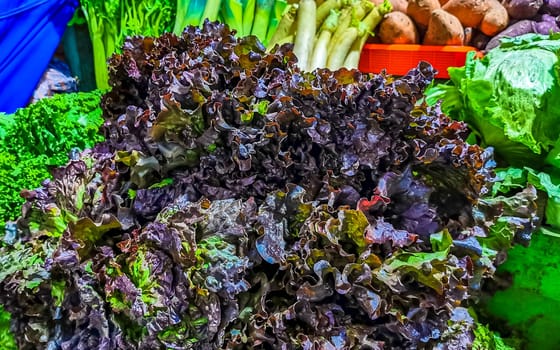 Fresh vegetables Fruit and salad Greens Herbs at the mexican market in Zicatela Puerto Escondido Oaxaca Mexico.