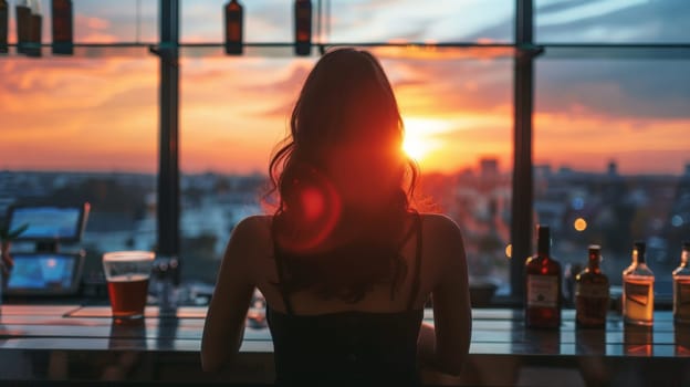A woman sitting at a bar with the sun setting behind her