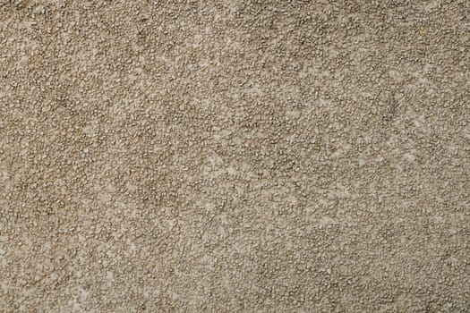 small gravel stucco wall finish texture and full-frame background.