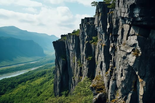 Top view of beautiful rocks with greenery in the fog.