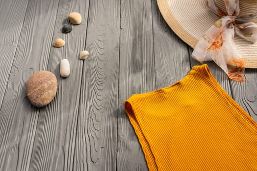 beachwear orange woman top outfit hat bag sun protection sunglasses pebbles. Summer background template mockup free space composition sample text. Top view above wooden background vacation concept