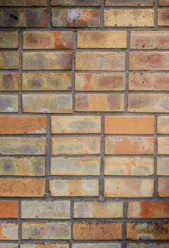 High resolution texture of a yellow brick wall. Laying horizonta