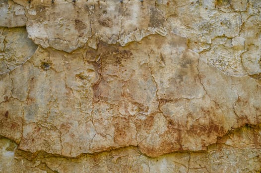 Texture of a concrete wall with cracks and scratches which can be used as a background 4