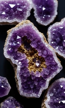 Amethyst on a black background. Macro shooting of natural jewels