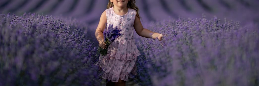 Lavender field girl. happy girl in pink dress in a lilac field of lavender. Aromatherapy concept, lavender oil, photo session in lavender.