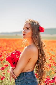 Woman poppies field. portrait of a happy woman with long hair in a poppy field and enjoying the beauty of nature in a warm summer day