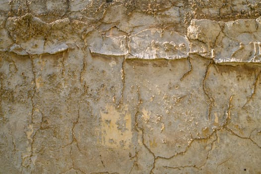 Texture of a concrete wall with cracks and scratches which can be used as a background 3
