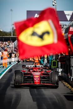 MELBOURNE, AUSTRALIA - MARCH 24: Charles LeClerc of Monaco and Scuderia Ferrari returns to the pits after winning the 2024 Australian Grand Prix at Albert Park in Melbourne, Australia