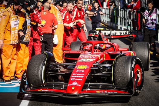 MELBOURNE, AUSTRALIA - MARCH 24: Carlos Sainz of Spain and Scuderia Ferrari returns to the pits after winning the 2024 Australian Grand Prix at Albert Park in Melbourne, Australia