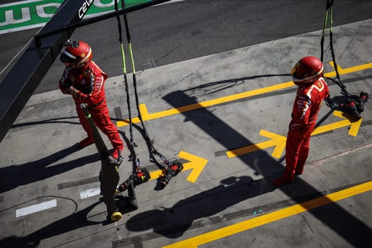 MELBOURNE, AUSTRALIA - MARCH 24: Scuderia Ferrari pit crew before winning the 2024 Australian Grand Prix at Albert Park in Melbourne, Australia