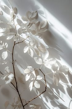 Delicate white leaves cast shadows on a clean surface, ideal for Nordic-inspired decor, simplistic backgrounds, or nature-themed graphics. Vertical format. Generative AI