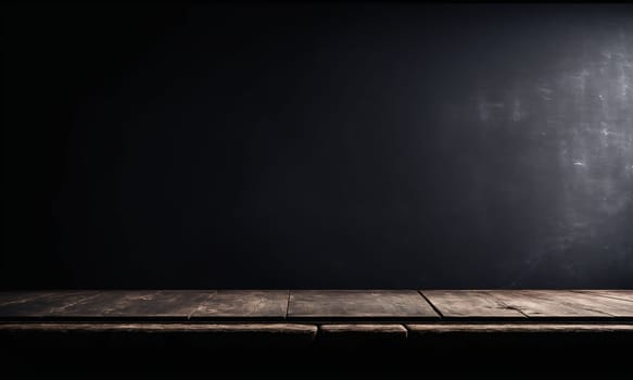 Blank blackboard with wooden frame on a dark wooden background