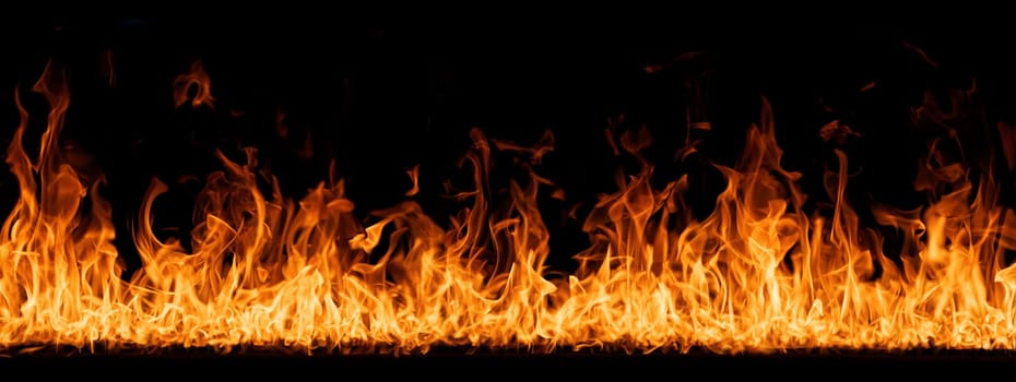 Hell flames, devil's mouth. fire banner. A background of scalding flames. Firestorm. Fire burning. Bright burning flames on a black background. Wall of Real fire, abstract background. Fire flames.