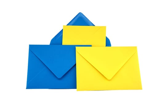 Collection of blue and yellow paper envelopes arranged against a white background