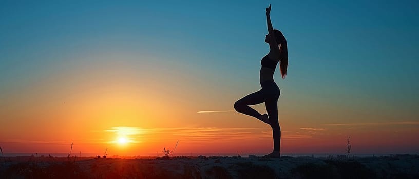 Silhouette of a yoga practice at dawn, representing tranquility and balance