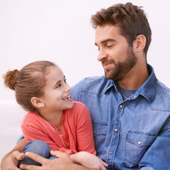 Hug, family and father with girl kid and happiness with smile and cheerful with conversation and bonding together. Single parent, embrace and fun with dad and daughter with weekend break and joyful.