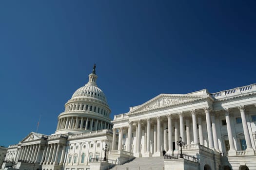 The washington dc capitol detail on the deep blue sky background