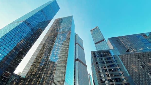 Office buildings. Skyscrapers in the business center. Modern architecture, glass facade of residential or commercial real estate