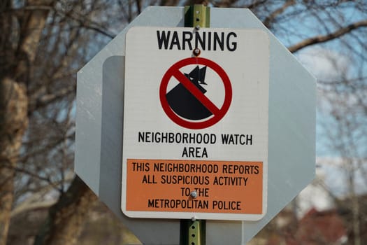 Warning neghborhood watching area in washington DC georgetown painted houses detail