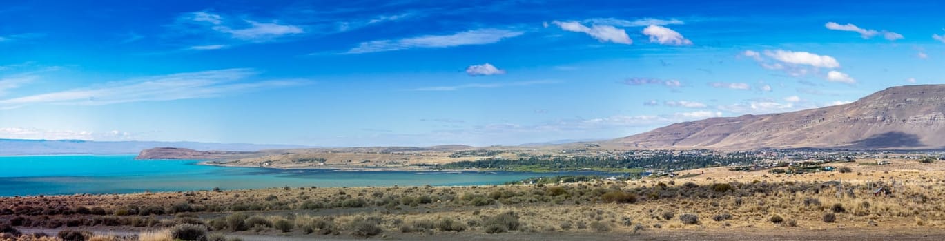 Scenic panoramic of El Calafate, Argentina with blue waters and mountains.