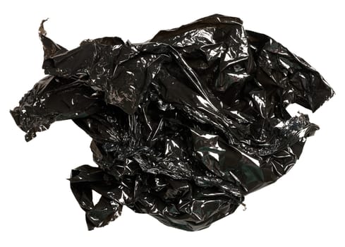 Crumpled piece of black polyethylene on isolated background