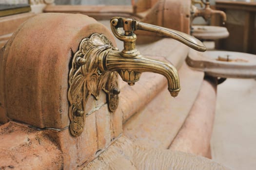 Vintage faucet with a source of mineral water in Vichy,France.