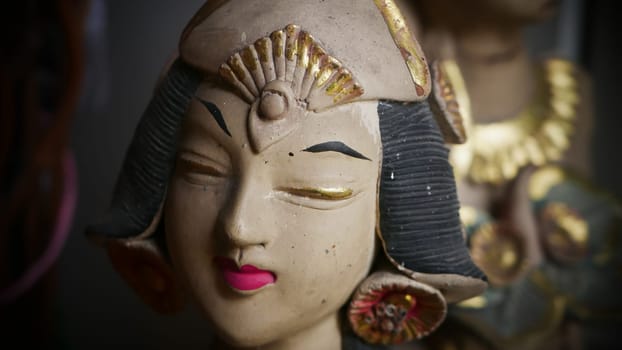 statue of a Balinese or javanese dancer used as garden gnome decoration, javanese gnome indonesia asian garden statue