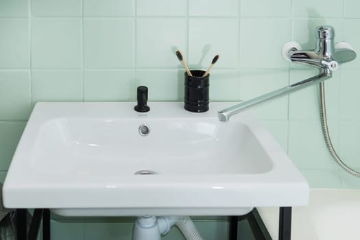 Budget bathroom interior in bright colors. Details of the bathroom interior
