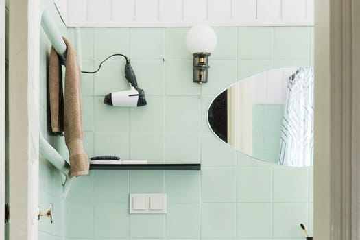 Budget bathroom interior in bright colors. Details of the bathroom interior