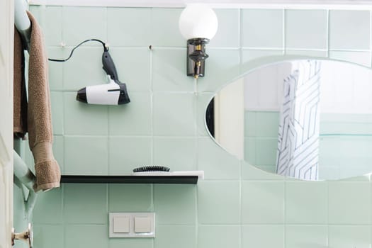 Budget bathroom interior in bright colors. Details of the bathroom interior