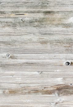 Brown and gray wood texture background coming from natural tree. The wooden panel has a beautiful dark pattern, hardwood floor texture.