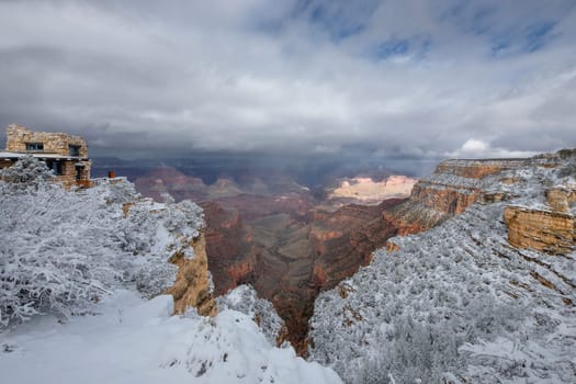 Fresh snow has fallen at the South Rim of The Grand Canyon at Grand Canyon National Park, Arizona