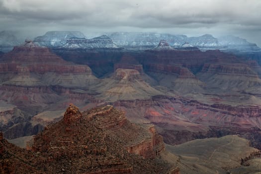 Fresh snow has fallen at the South Rim of The Grand Canyon at Grand Canyon National Park, Arizona