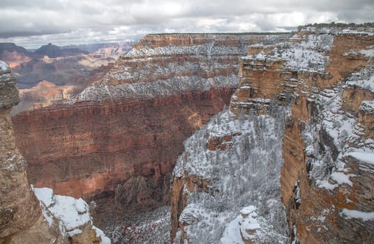 Fresh snow has fallen at the South Rim of The Grand Canyon at Grand Canyon National Park, Arizona