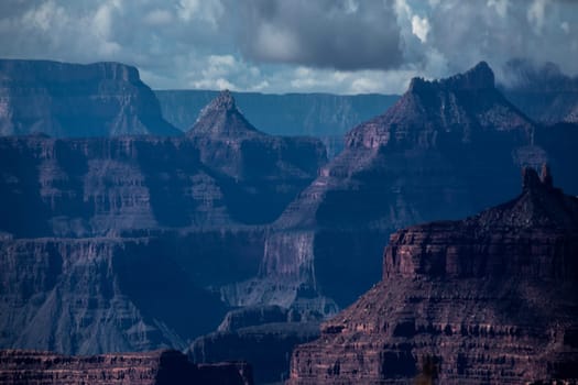 Passing rain storm produces a filtered light at Grand Canyon National Park, Arizona