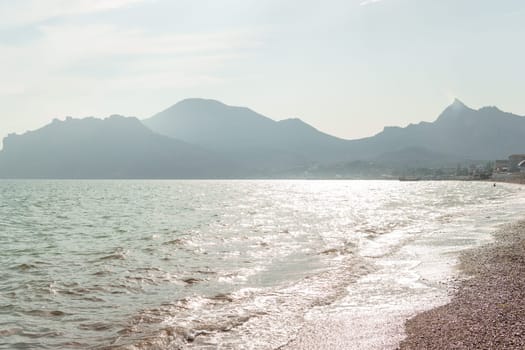 Beach Relaxation at the Black Sea. Fairy-tale Moments of a Sunny Day. The concept of tourism and sea travel.