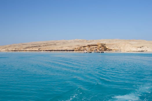 Beach Relaxation at the Red Sea. Fairy-tale Moments of a Sunny Day. The concept of tourism and sea travel.