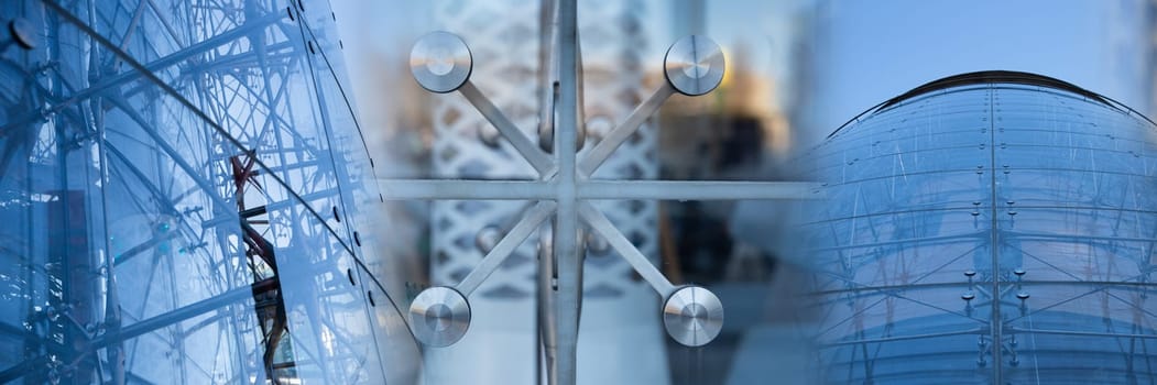 Glass facade with steel handles as a frame. Modern construction in Lublin. Transparent walls of the building.