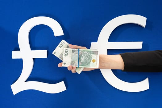 A stack of banknotes in the palm of your hand as a sign of readiness and changes in cash circulation throughout Europe.