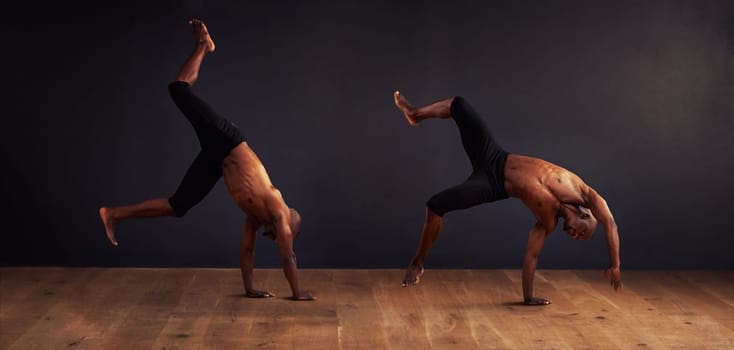 Movement, dancer and contemporary in studio for acrobatics, competition and training. Composite, balance and young black man for professional, performance arts and workout with dark background.