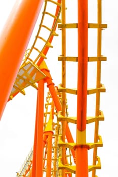 Rollercoaster on white background, closeup of photo.