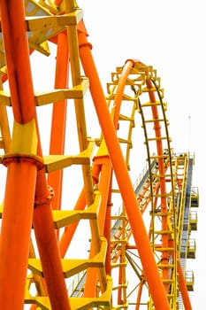 Rollercoaster on white background, closeup of photo.