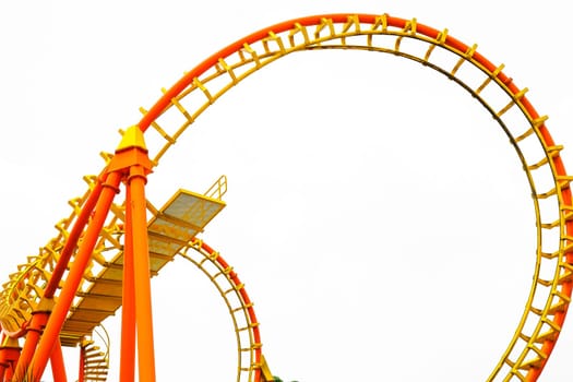 Rollercoaster on white background, closeup of photo.